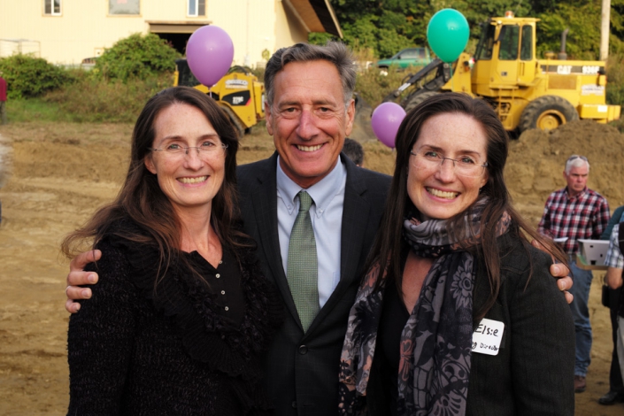 photo of Vermont senator smiling with the founders of NECCA at the new facility construction site.
