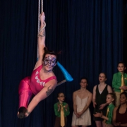 photo of Erin Ball, double leg amputee, performing at NECCA's Flying Nut Christmas show