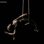 photo of an older woman performing on trapeze