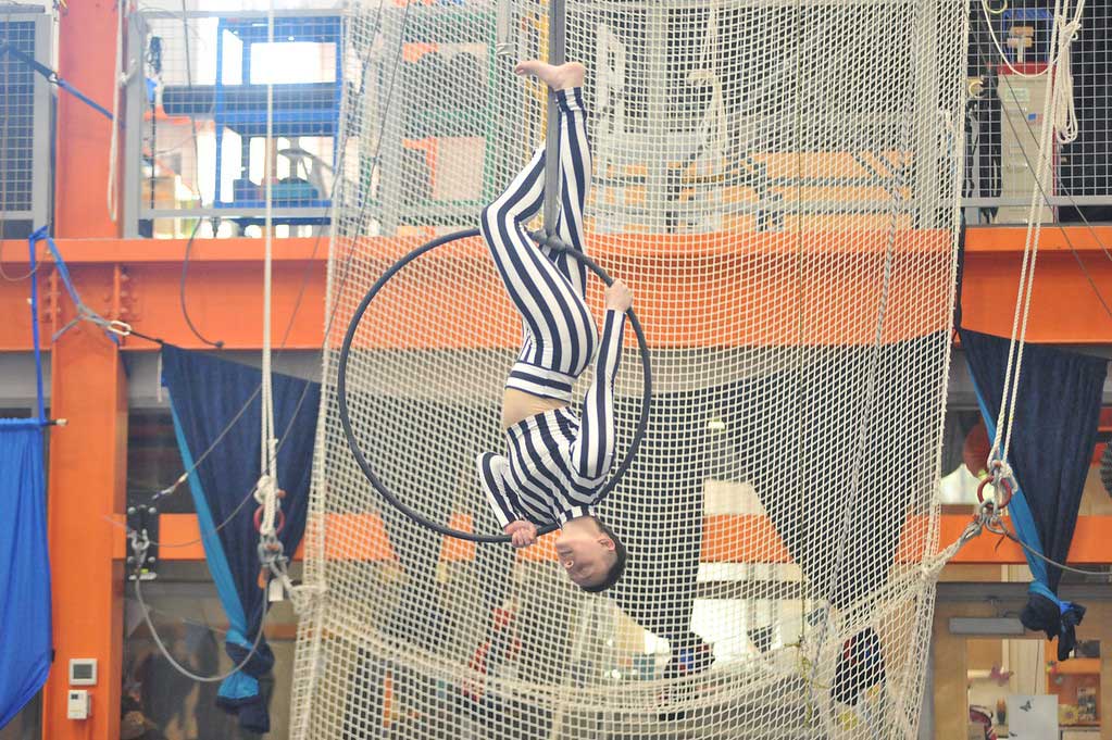image of kaitlyn lawhorne performing on aerial hoop
